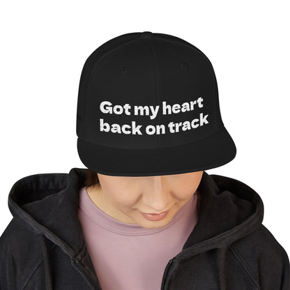 White Font "Got my heart back on track" Snapback Cap, Embroidered Hat, Casual Streetwear, (Many color variants)