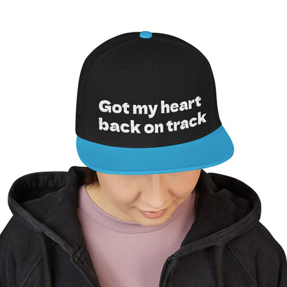 White Font "Got my heart back on track" Snapback Cap, Embroidered Hat, Casual Streetwear, (Many color variants)