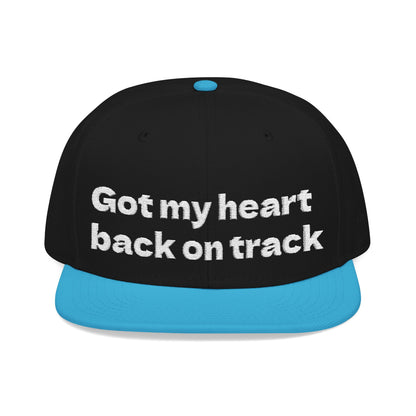 White Font "Got my heart back on track" Snapback Cap, Embroidered Hat, Casual Streetwear, (Many color variants)