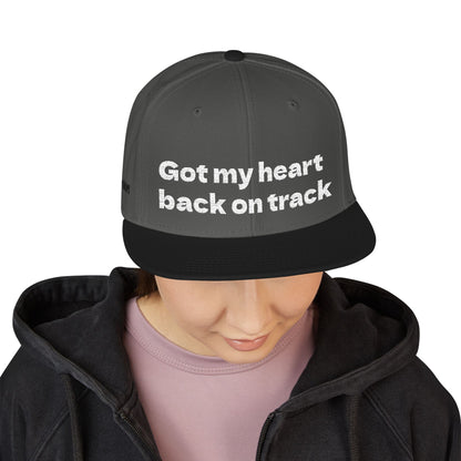 White Font "Got my heart back on track" Snapback Cap, Embroidered Hat, Casual Streetwear, (Many color variants)